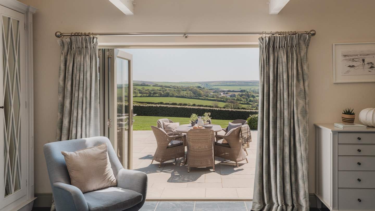 Additionally, the master bedroom has lovely bi-folding doors that open out onto the terrace and far-reaching views of the rolling countryside