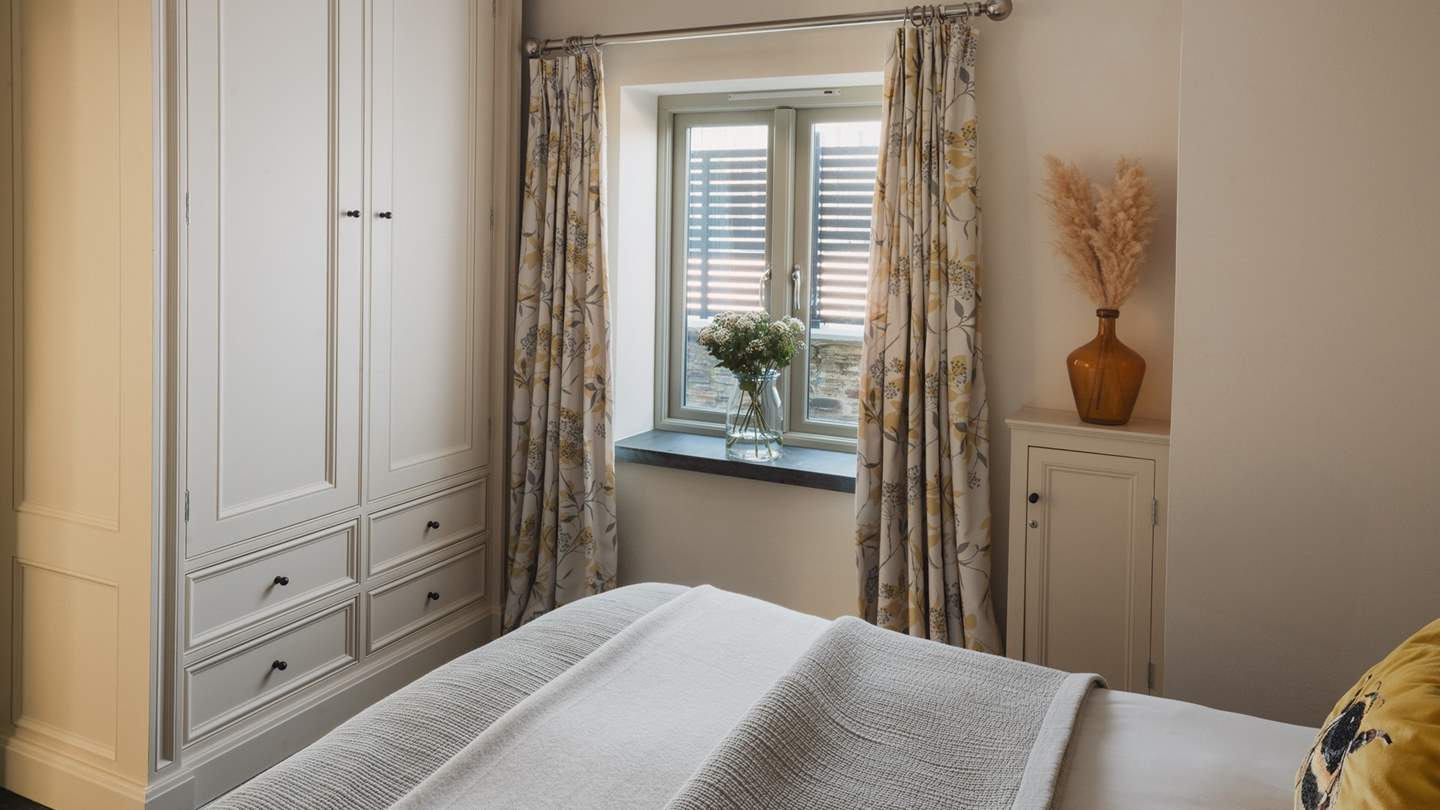 For storing belongings there is plenty of space in the wardrobe and with drawers beneath 