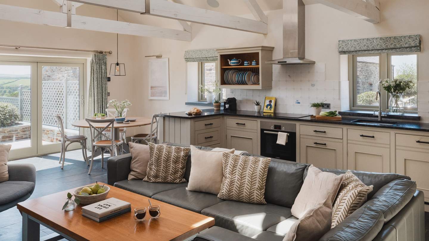 The bespoke kitchen with granite work surfaces and hand-crafted cupboards house everything a budding chef might need 