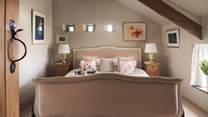 Bedroom one has a gorgeous super king size bed, roll top bath and en suite