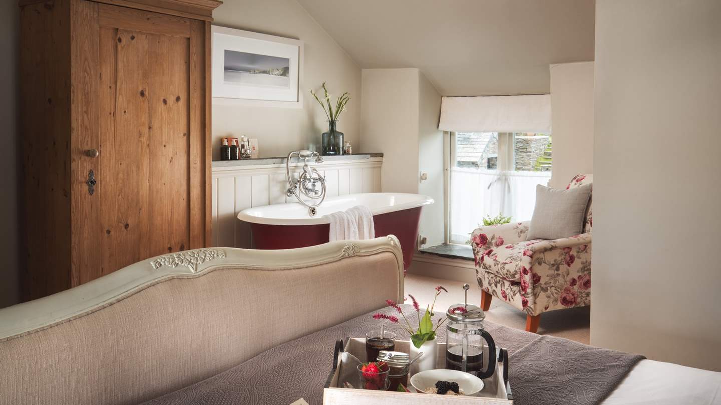 Bedroom one has a super king-size bed and a roll top bath with a view out to sea