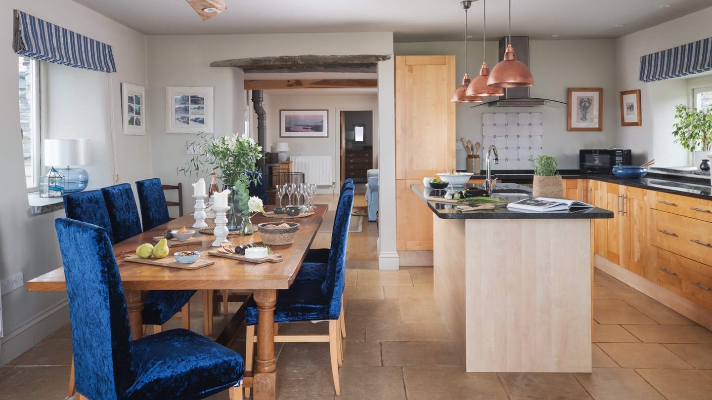 A large farmhouse style kitchen awaits with granite work surfaces, hand crafted oak units, a butler sink and all the mod-con appliances and more