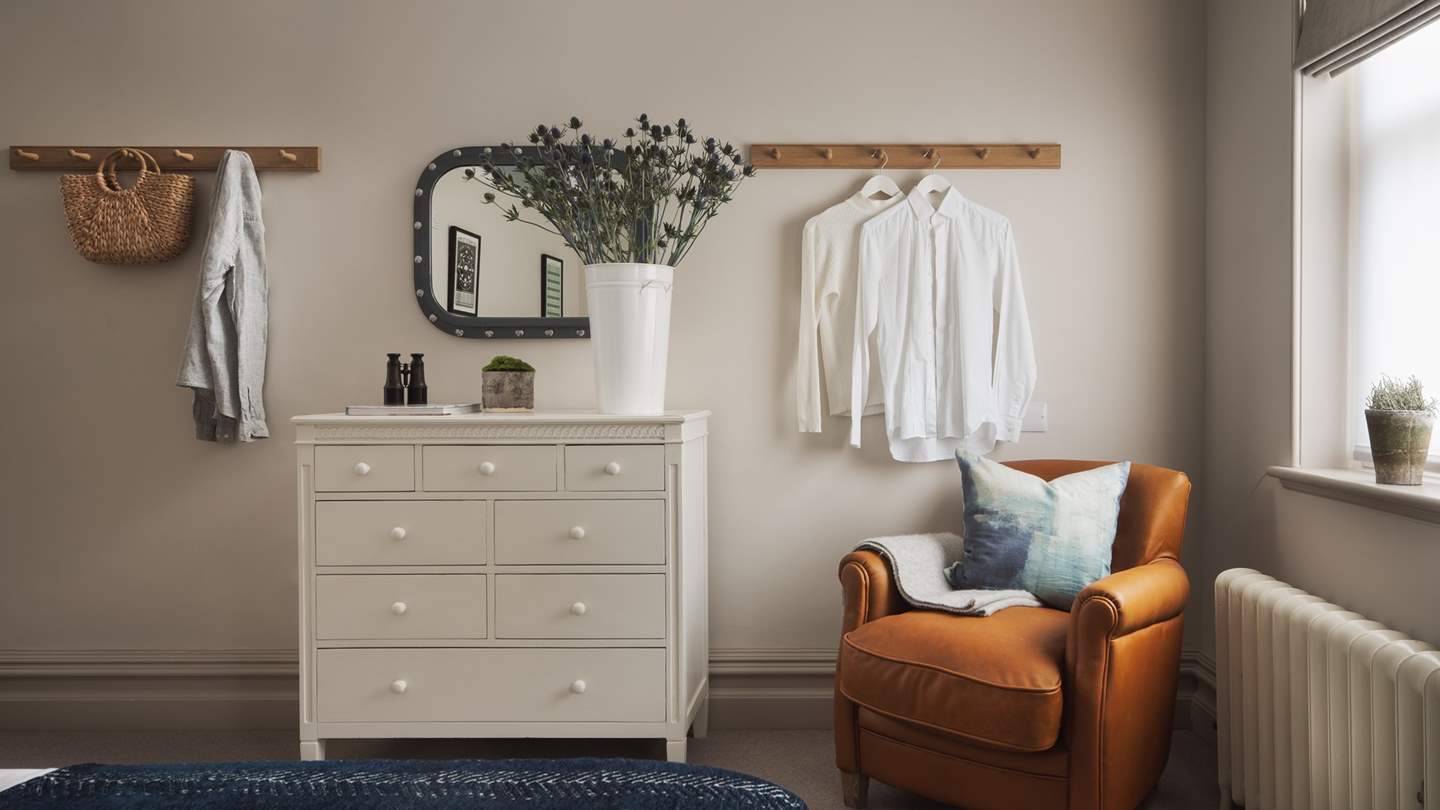 Relax with a novel on the comfy occasional chair... 