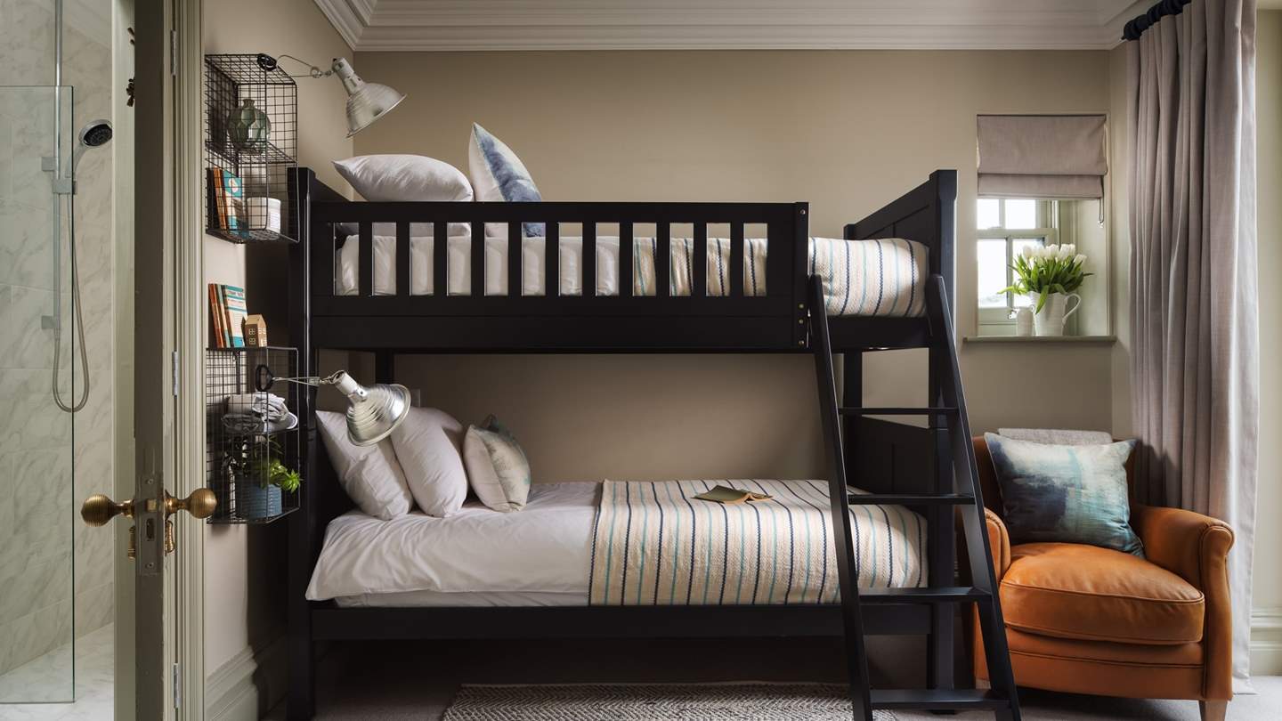 This wonderful bunk bedroom offers direct access to the terrace