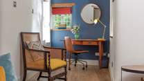 A tucked-away office area just off the sitting room if you need to catch up on work.