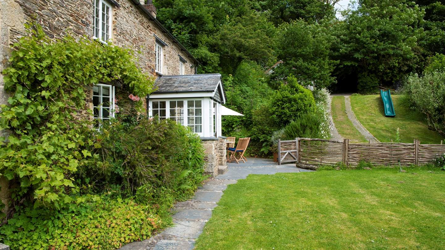 The beautifully planted, multi-level cottage garden was designed by Dominic Cole (landscape architect to both Heligan and the Eden Project). 