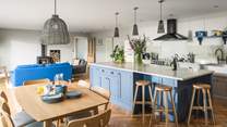 The Scandinavian-designed open plan living, dining and kitchen area covers most of the ground floor 