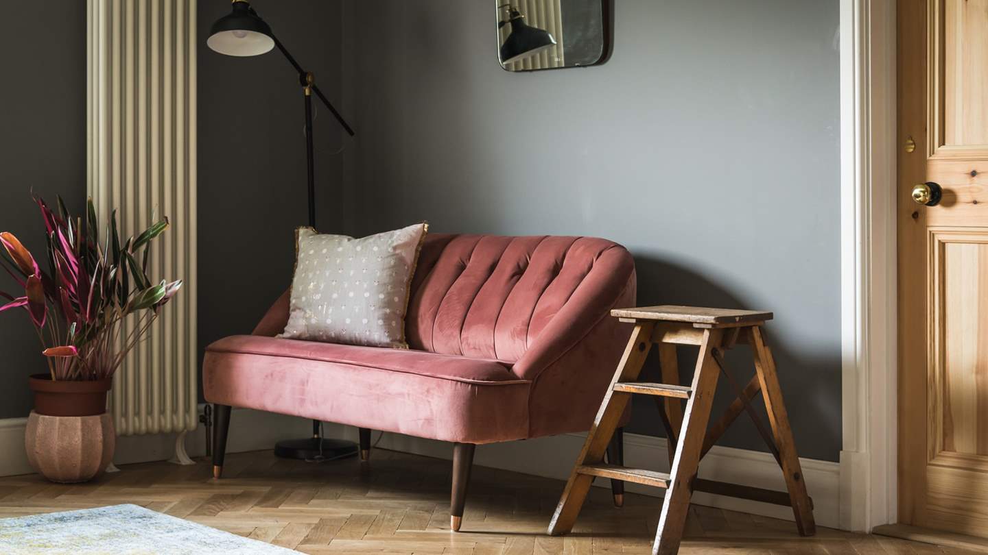 Settle down with your latest page turner on the sumptuous velvet sofa