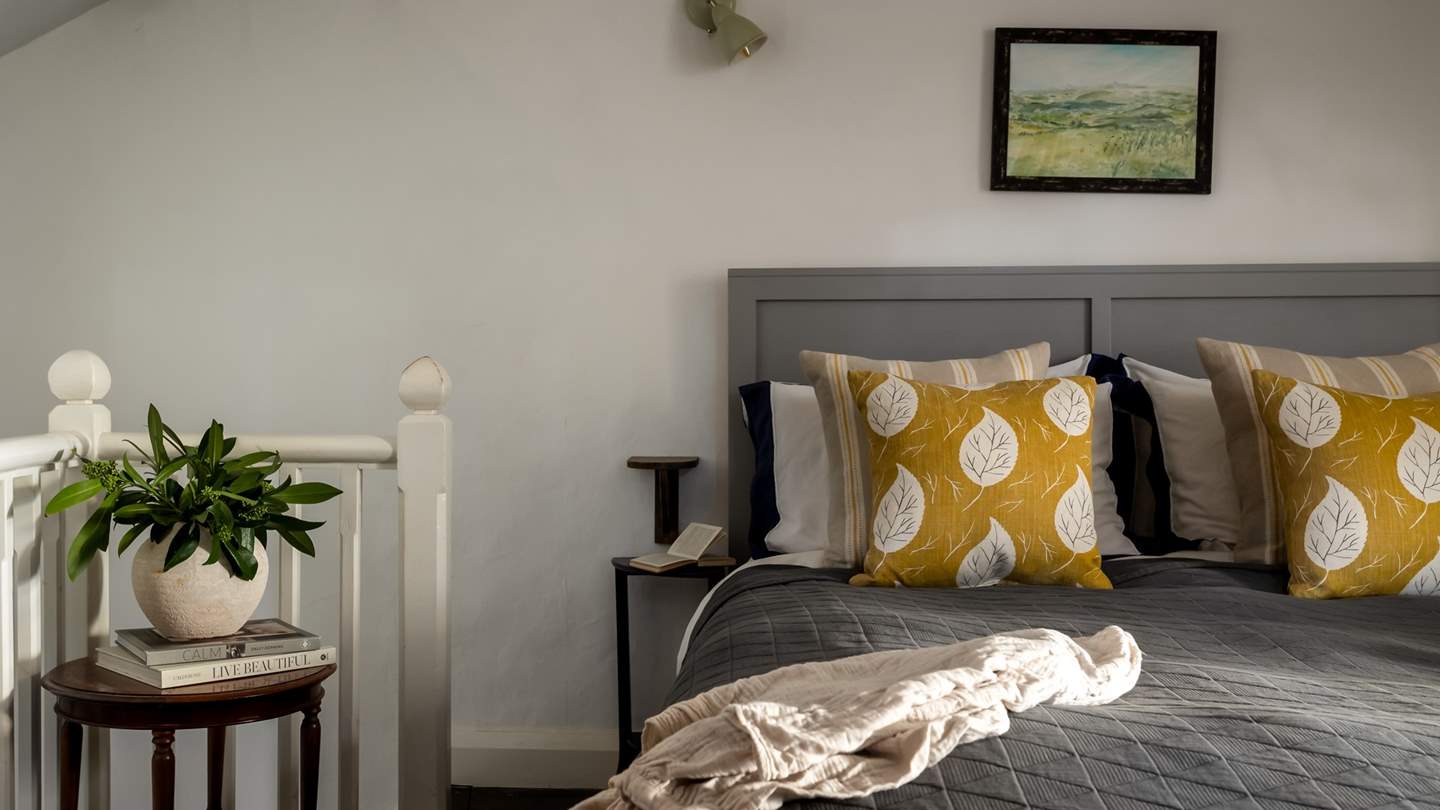 The master bedroom is a soothing space with an exquisite king-sized bed