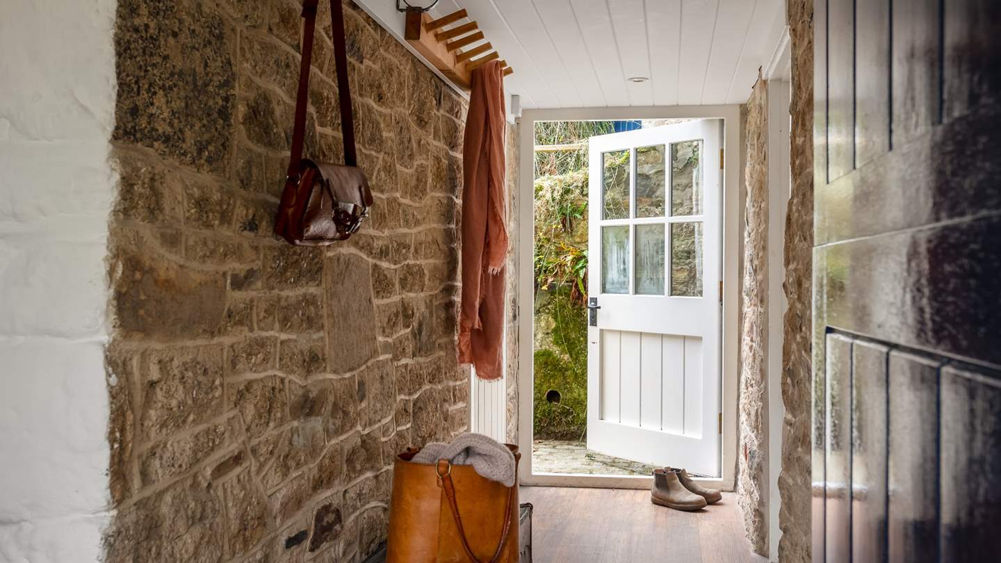 Lopes Cottage offers an abundance of original features from the undulating granite walls and dark wooden floors to whitewashed beamed ceilings 