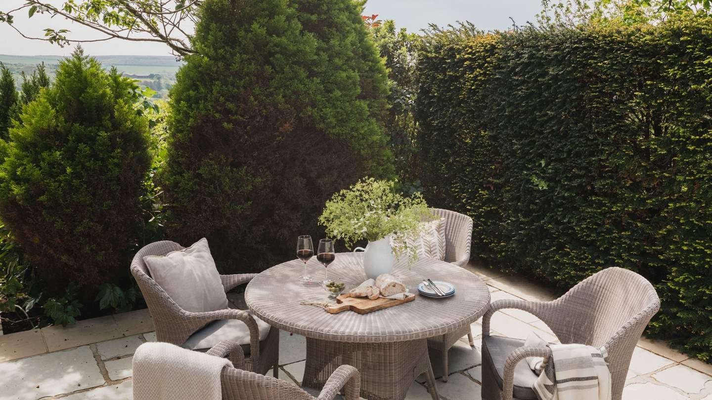 The pretty little private patio offers breath-taking country views and a large table and chairs for a spot of alfresco dining