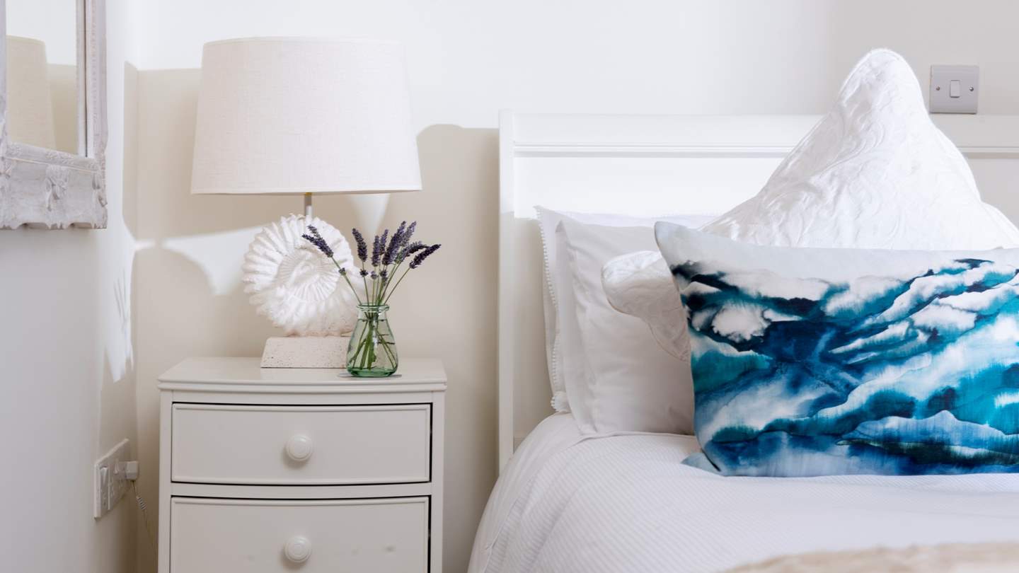 Both bedrooms come swathed in sumptuous bedding, throws and cushions so you'll feel like you're falling asleep amongst the clouds