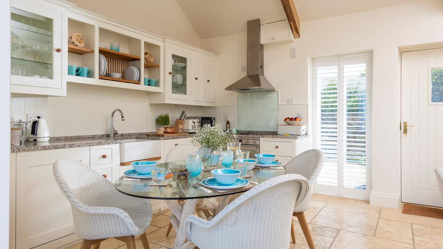 There's a fabulous driftwood and glass dining table
