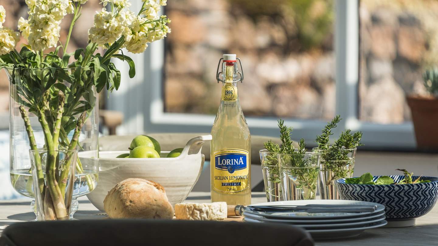 Enjoy long, lazy lunches in the conservatory - just what holidays are all about!