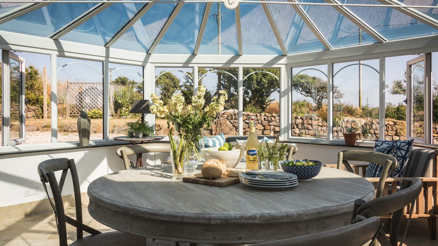 The perfect spot for breakfasts or more informal dining, the conservatory is a wonderful setting overlooking the garden.