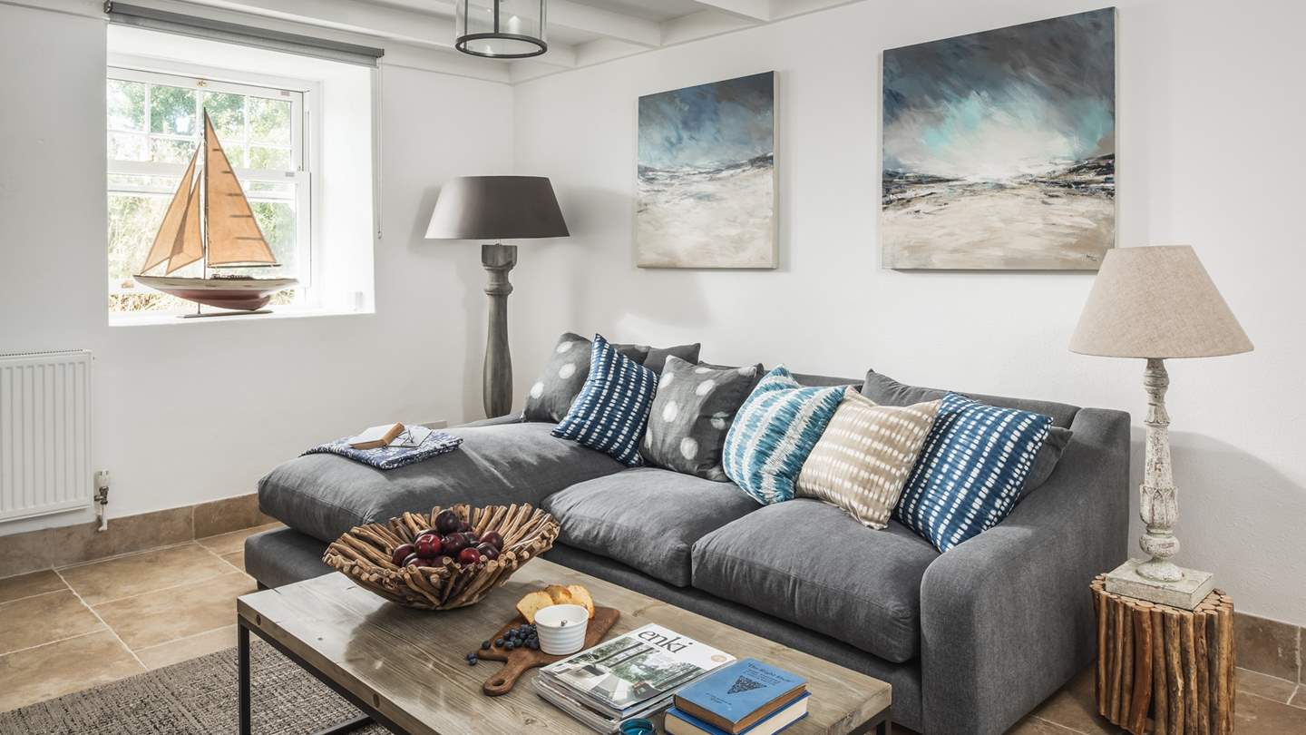 The snug is also home to the TV, making this the ideal space for film nights and for catching up on Netflix.