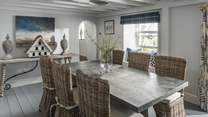 The large living room is also home to the formal dining table - ideal for dinner parties.
