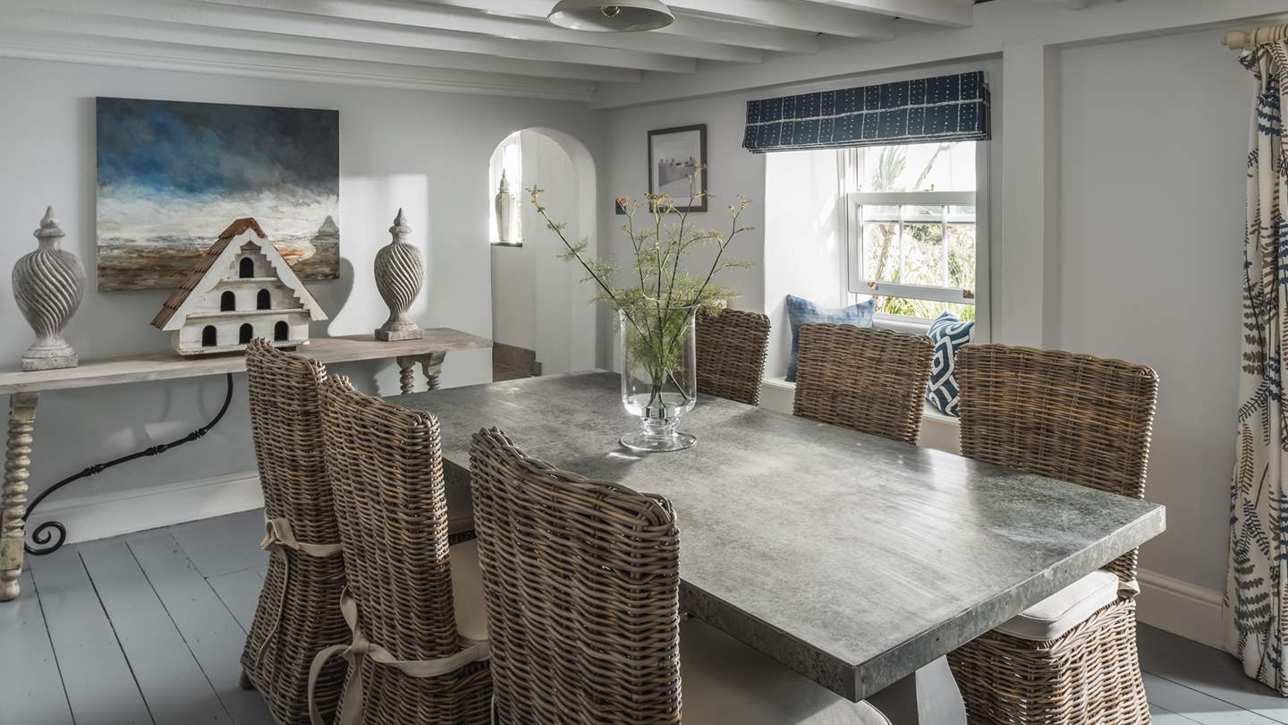 The large living room is also home to the formal dining table - ideal for dinner parties.