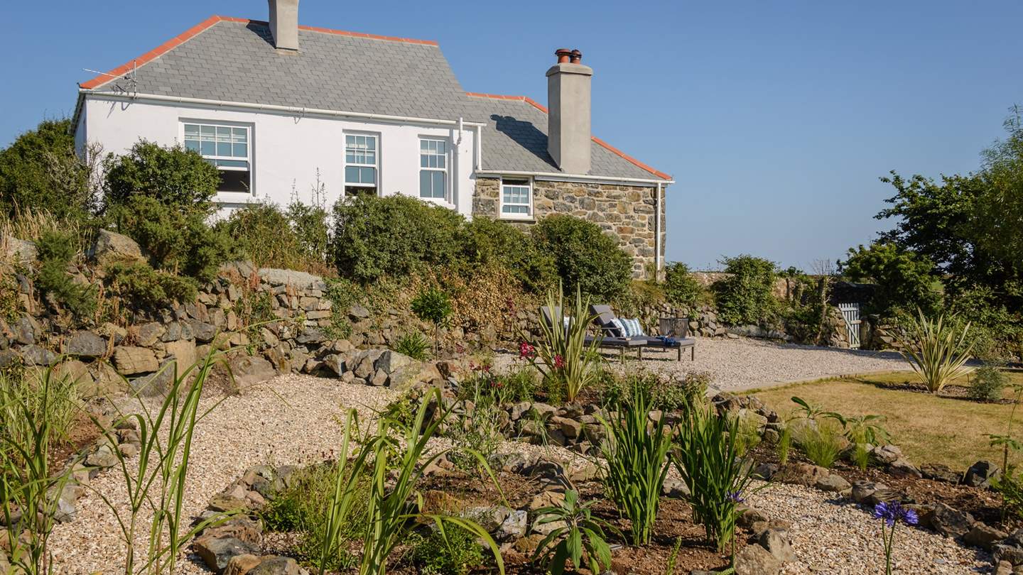 The main garden overlooks the fields and out to sea, and offers a peaceful spot to while away an afternoon or two.