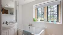 Grab a glass of wine, soak in the bath and bask in the sunshine streaming through the window. 
