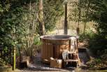 Tucked amongst the trees, you'll find the gorgeous wood-fired Eco hot tub 