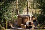 Tucked amongst the trees, you'll find the gorgeous wood-fired Eco hot tub 