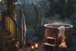 Nestled amongst a canopy of trees and with a gorgeous wooden hot tub, expect total peace and seclusion