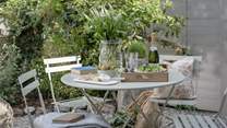 The cute cottage garden is ideal for alfresco meals or maybe a cocktail or two?