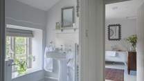 We love the simple yet chic decor of the bathrooms at April Cottage.