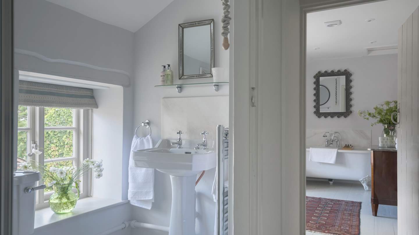 We love the simple yet chic decor of the bathrooms at April Cottage.