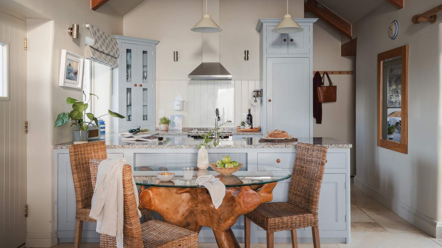 Adjoining the downstairs living area is a pretty kitchen containing everything you need to create a culinary delight