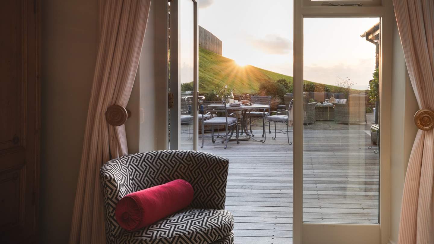 French doors open onto magical morning ocean vistas 