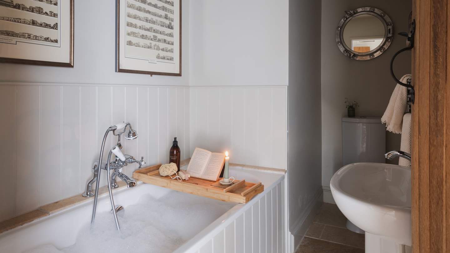The en suite bathroom with an indulgently deep bath beckons blissful soaks 