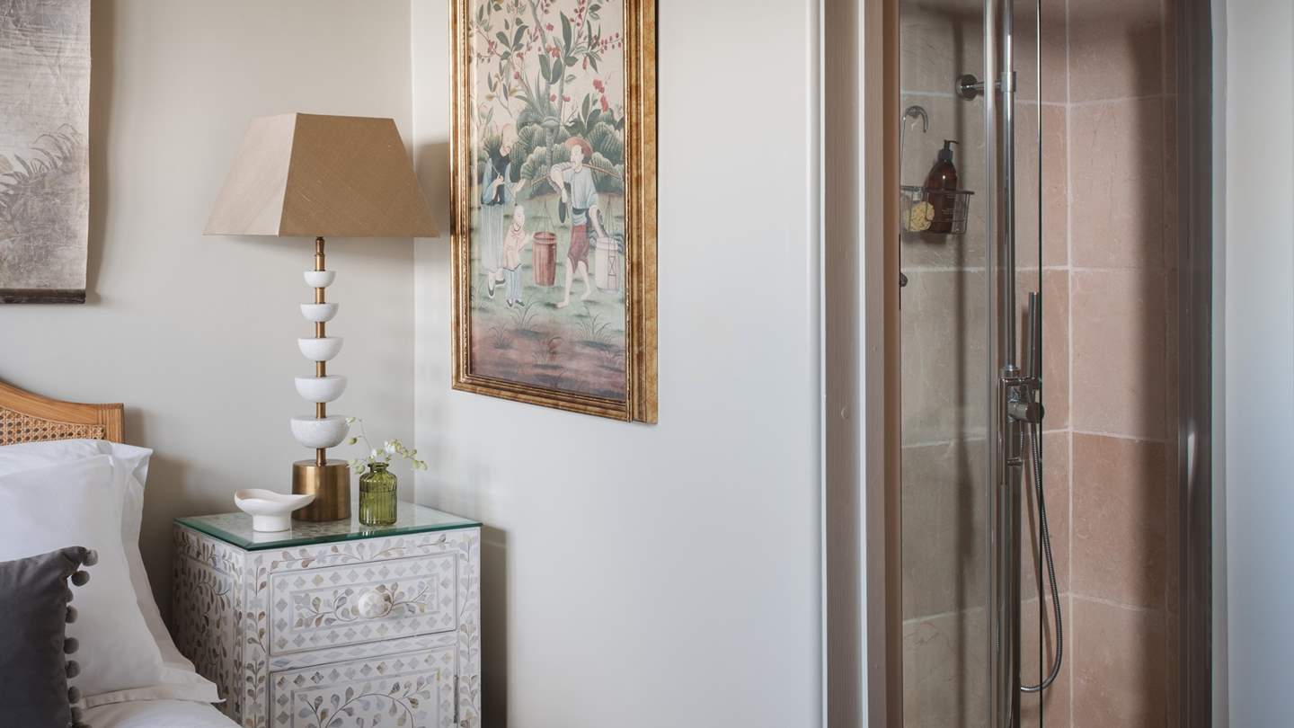 With an en suite shower room with a large walk-in shower