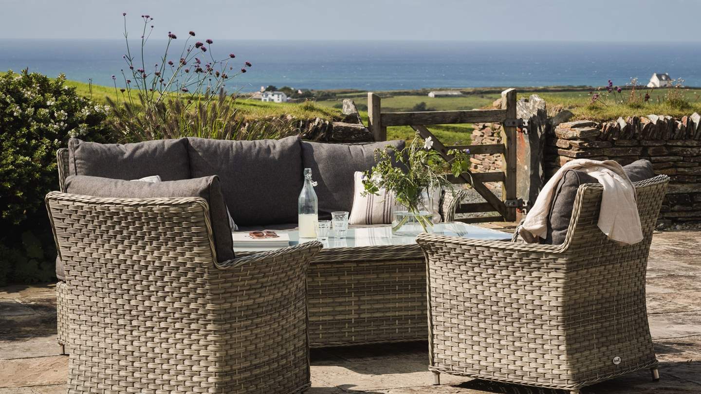 The patio beckons for dreamy moments of alfresco living...