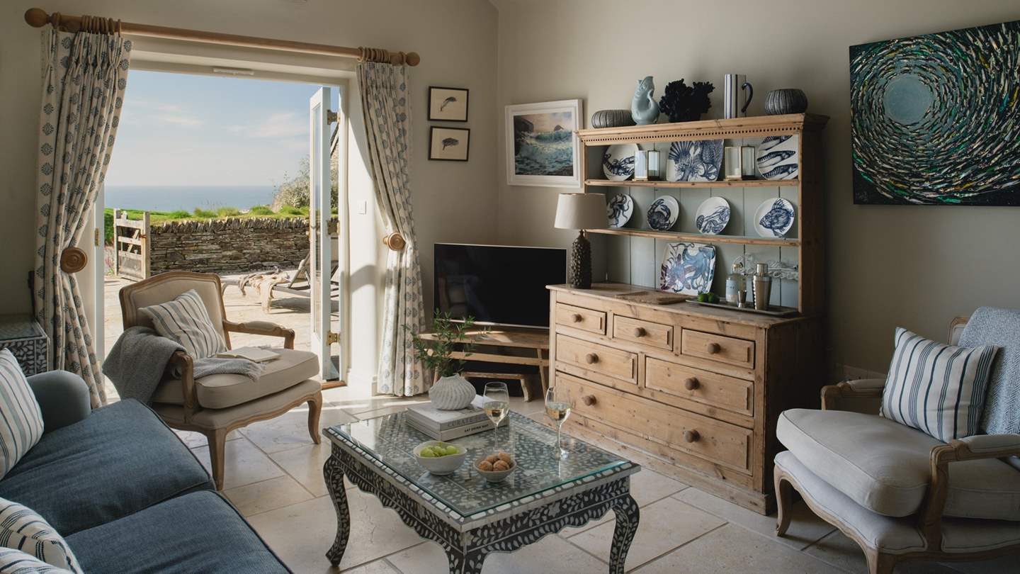 With a wonderful elevated position, the views over the farmland across to the sea are simply a dream