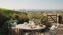 Make use of the outdoor dining table and chairs for spellbinding soirees and fire up the gas barbecue for alfresco repasts

