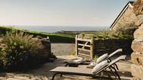 Soaking up endless sea views sat atop a Cornish clifftop