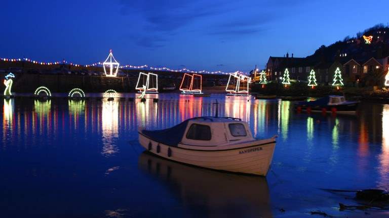 Visit Mousehole at Christmas to see the magical village lights