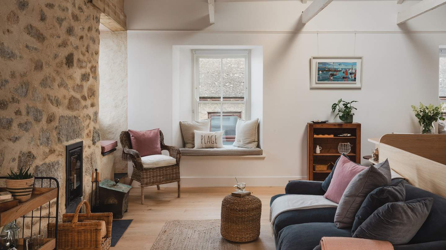 Sink into the deep grey, velvet Loaf sofa as the wood burning stove crackles and casts the room in a fire-warmed glow, or recline on the gorgeous chaise lounge with a book from the shelf