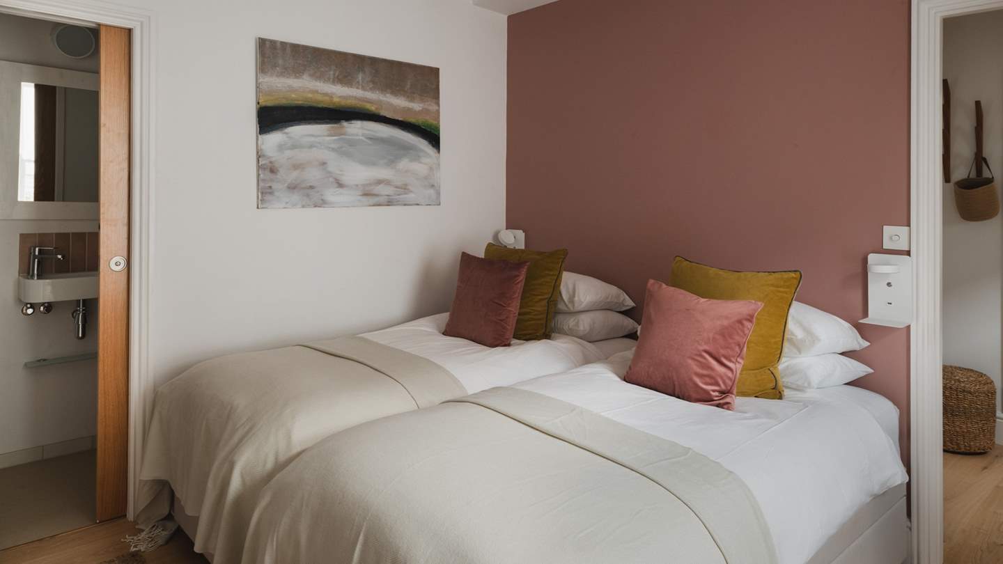 The second bedroom can be configured as either two single beds or one luxurious super king bed