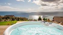Soak up magnificent sea views from the bubbling hot tub