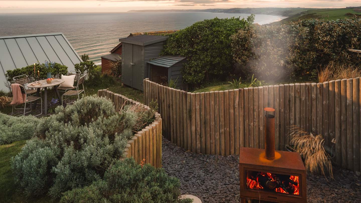 Sit beneath golden skies beside the warmth of the firepit 