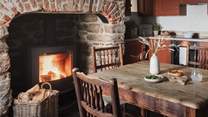 Complete with an inglenook fireplace and wood burning stove to create an inviting atmosphere in the cooler months