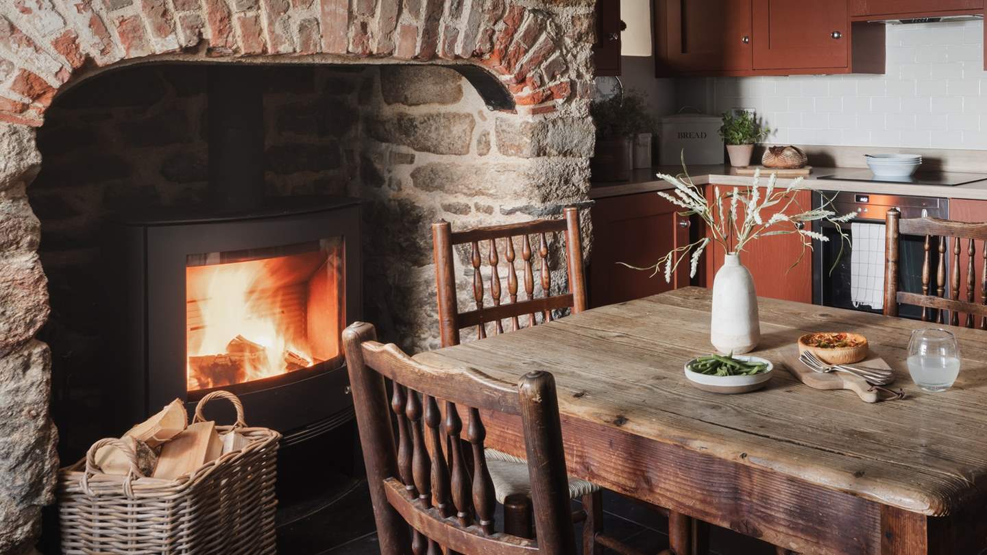 Complete with an inglenook fireplace and wood burning stove to create an inviting atmosphere in the cooler months