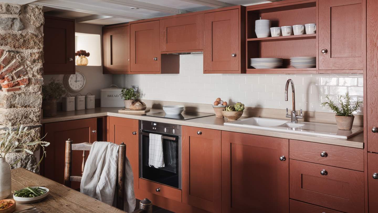The kitchen is fully-equipped to cater to all your staycation needs, with a Neff oven and dishwasher, Smeg hob and Le Creuset stoneware