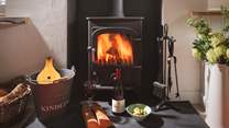 Curl up on the sofa in front of the toasty wood burner.