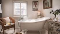 Enjoy heavenly soaks in the beautifully elegant slipper bath