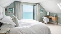 The en suite master bedroom lies on the first floor to the front of the house, and enjoys mesmeric sea views that can be enjoyed from the embrace of the super king size bed
