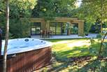 Take a decadent dip in the heavenly hot tub, tucked away in the magical forest - the ultimate spot to unwind...